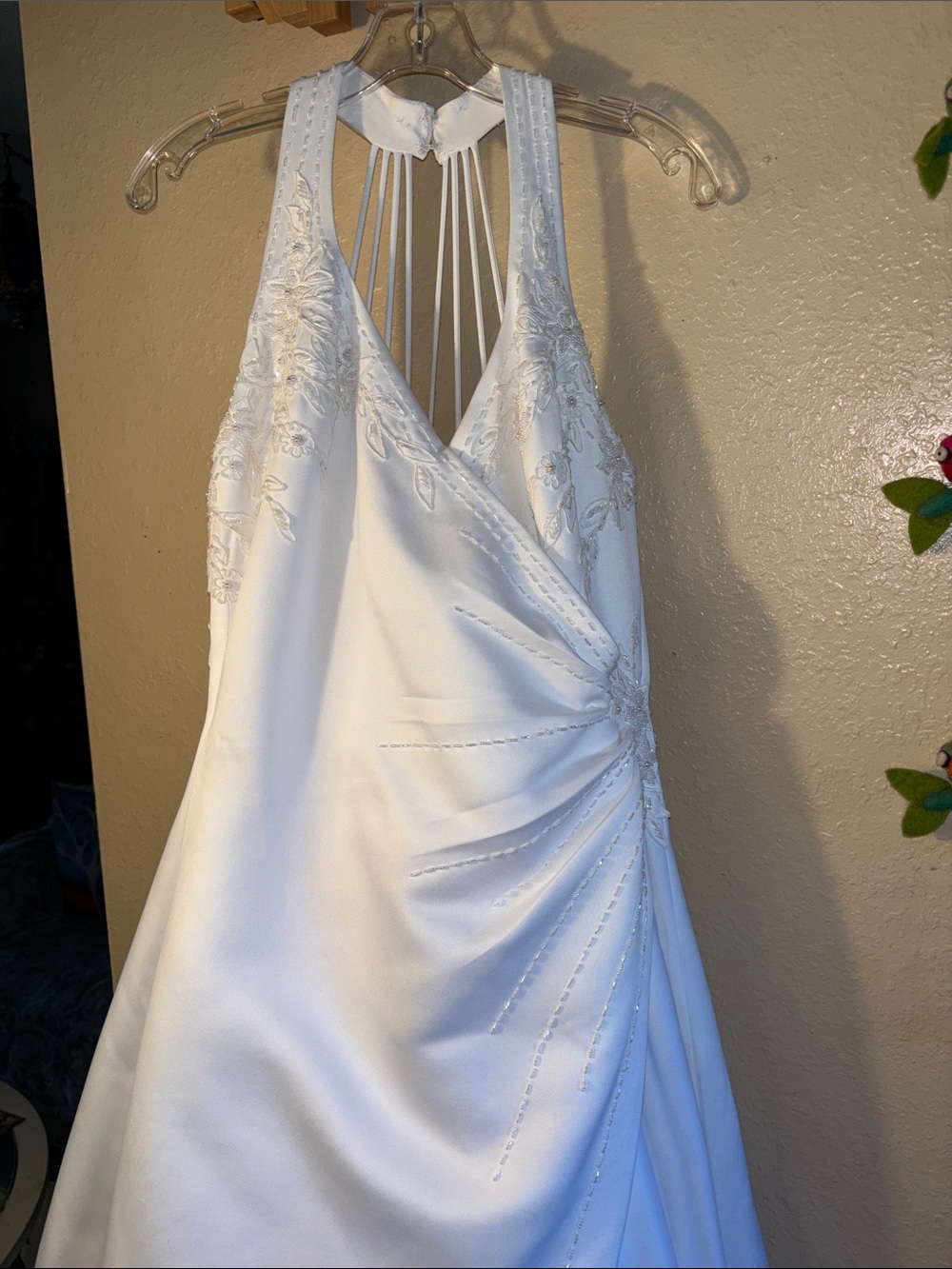 Signature wedding dress white satin style halter-style gown featuring a ruched